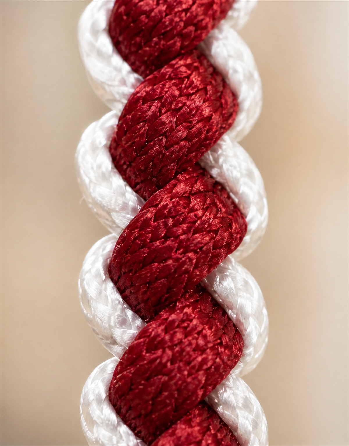 Macro of the red and white twist on the Anaar macrame bracelet