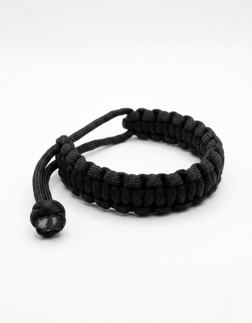 Aswad black paracord bracelet for men, handmade 550 cord cobra weave by Giraa, Pakistan