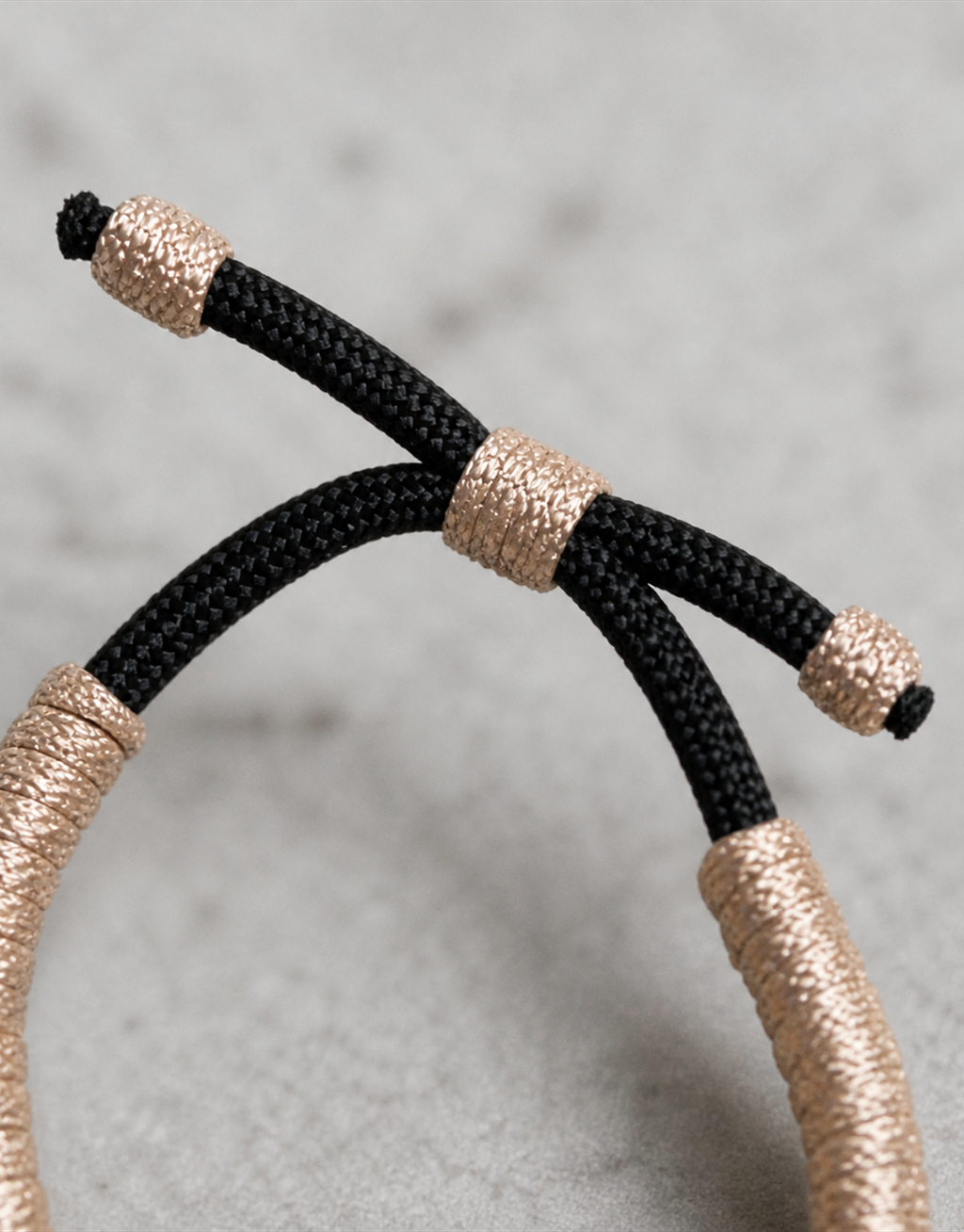 Macro of the black sliding closure on the Kathib bracelet