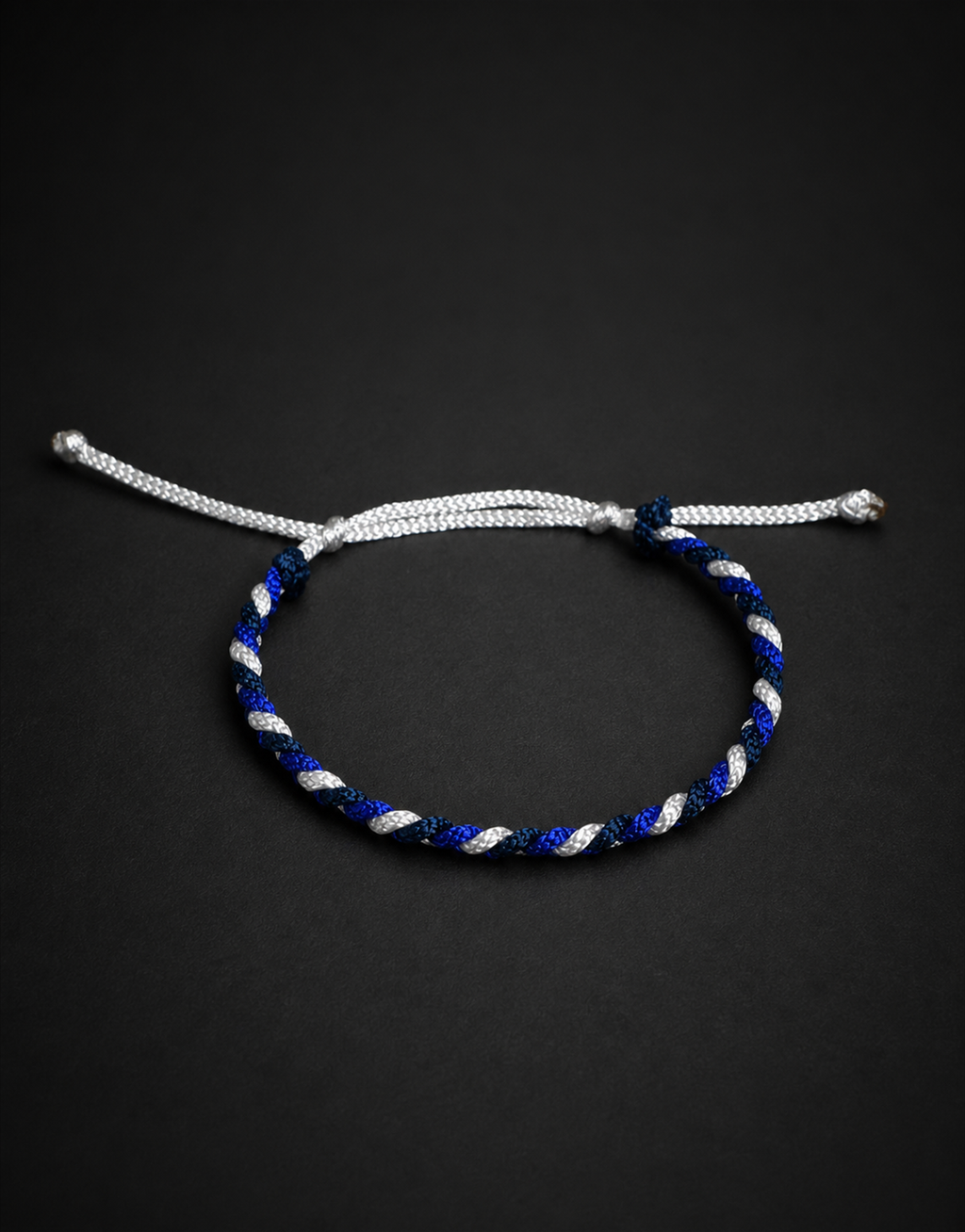 Sadeem blue, white and black bracelet on a black background