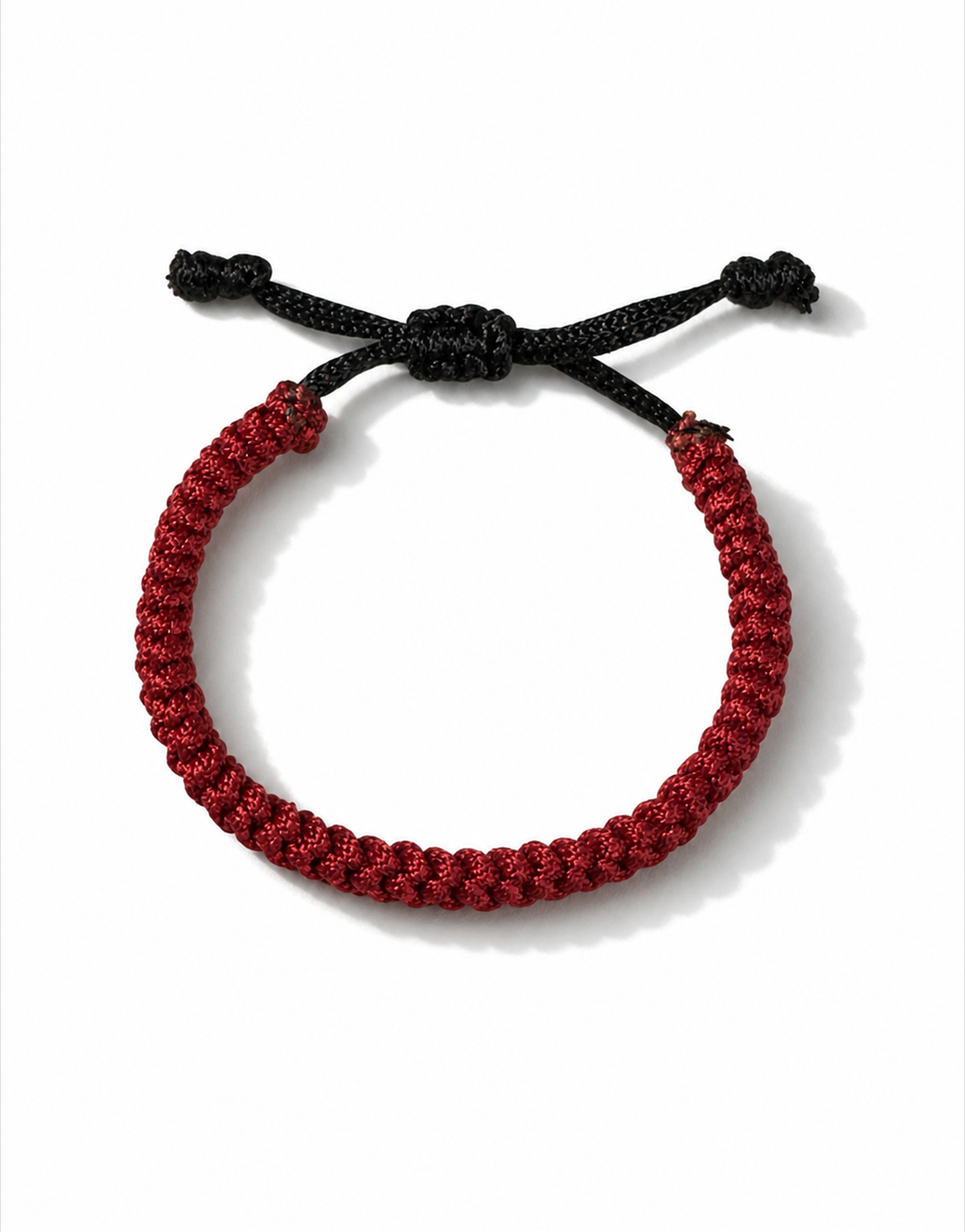 Jamr red and black macrame bracelet, handmade by Giraa in Pakistan