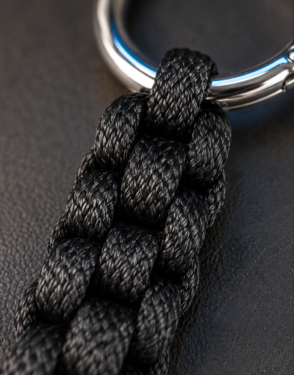 Macro of the black box weave on the Saf paracord keychain