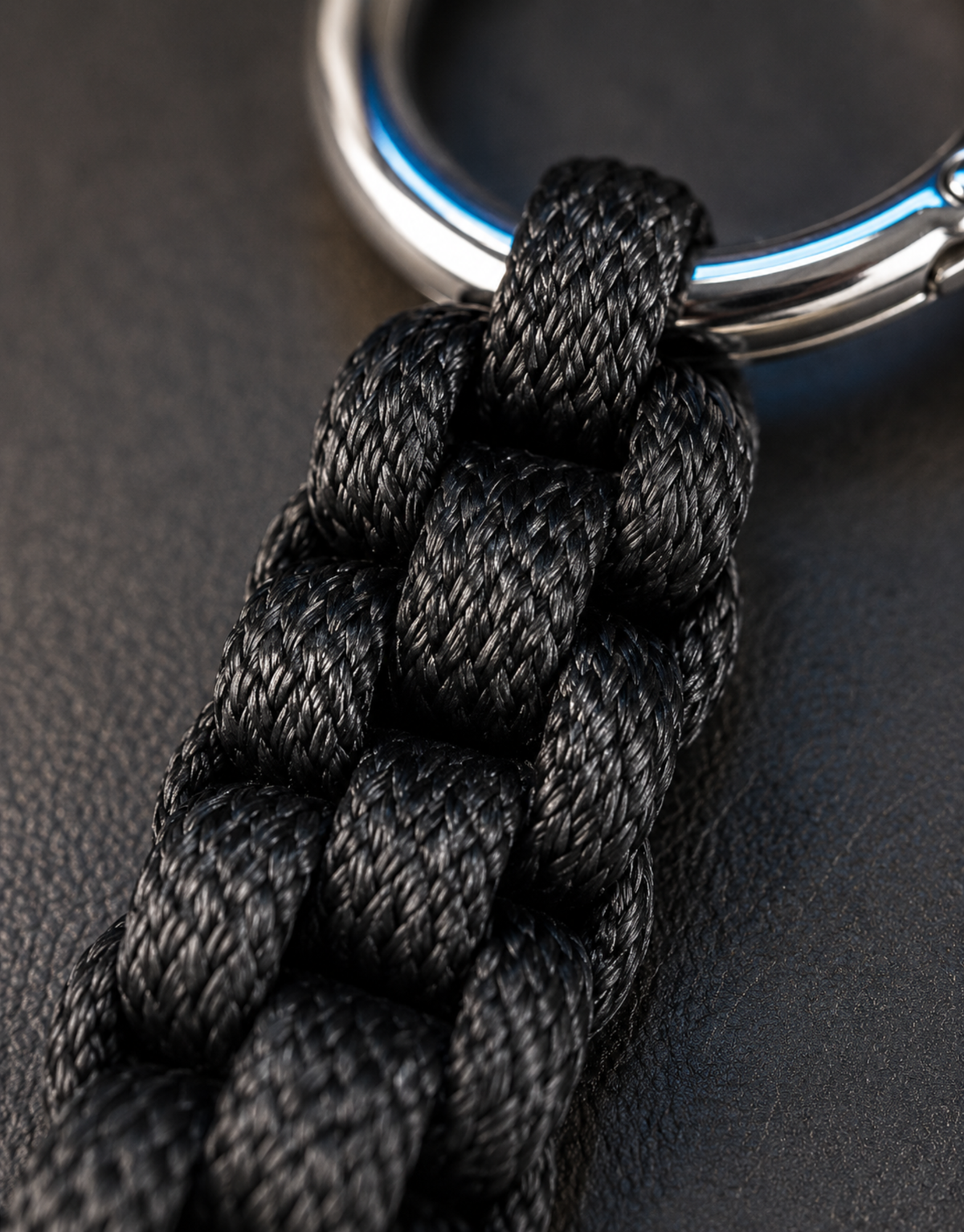 Macro of the black box weave on the Saf paracord keychain