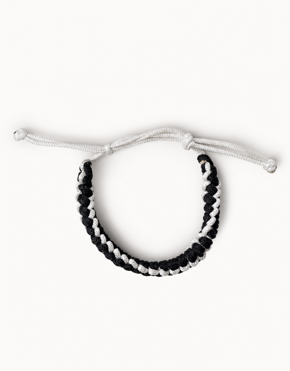 Shatranj black and white macrame bracelet, handmade by Giraa in Pakistan
