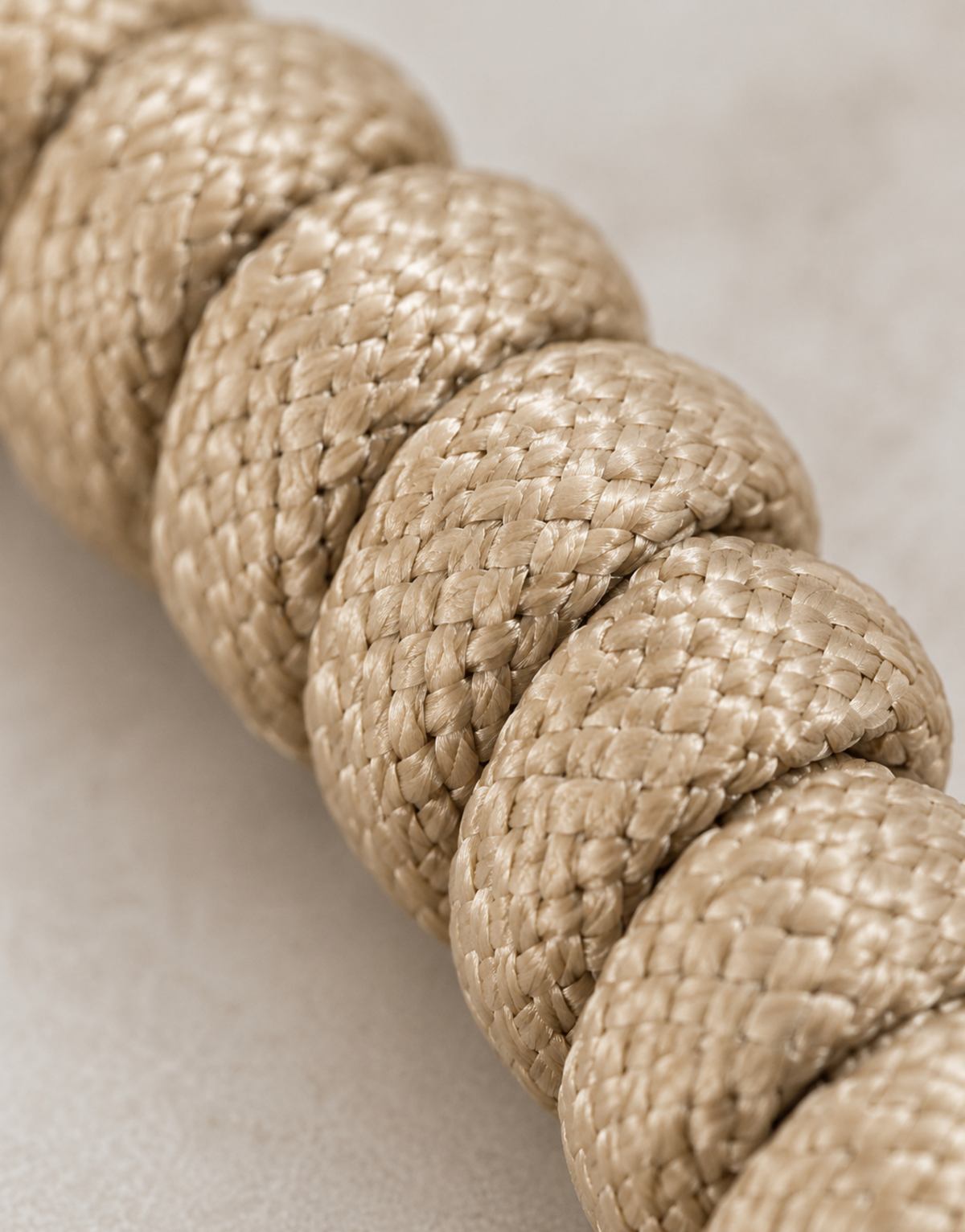 Macro of the Raml sand paracord spiral knot
