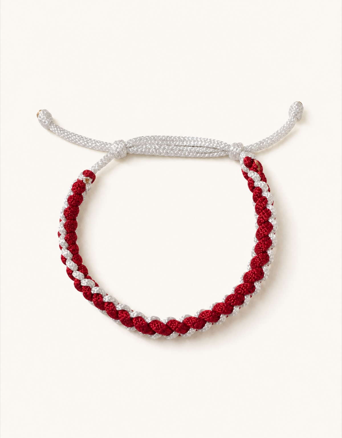 Anaar red and white twist macrame bracelet, handmade by Giraa in Pakistan