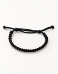 Khayt slim black macrame bracelet for men and women, handmade by Giraa in Pakistan