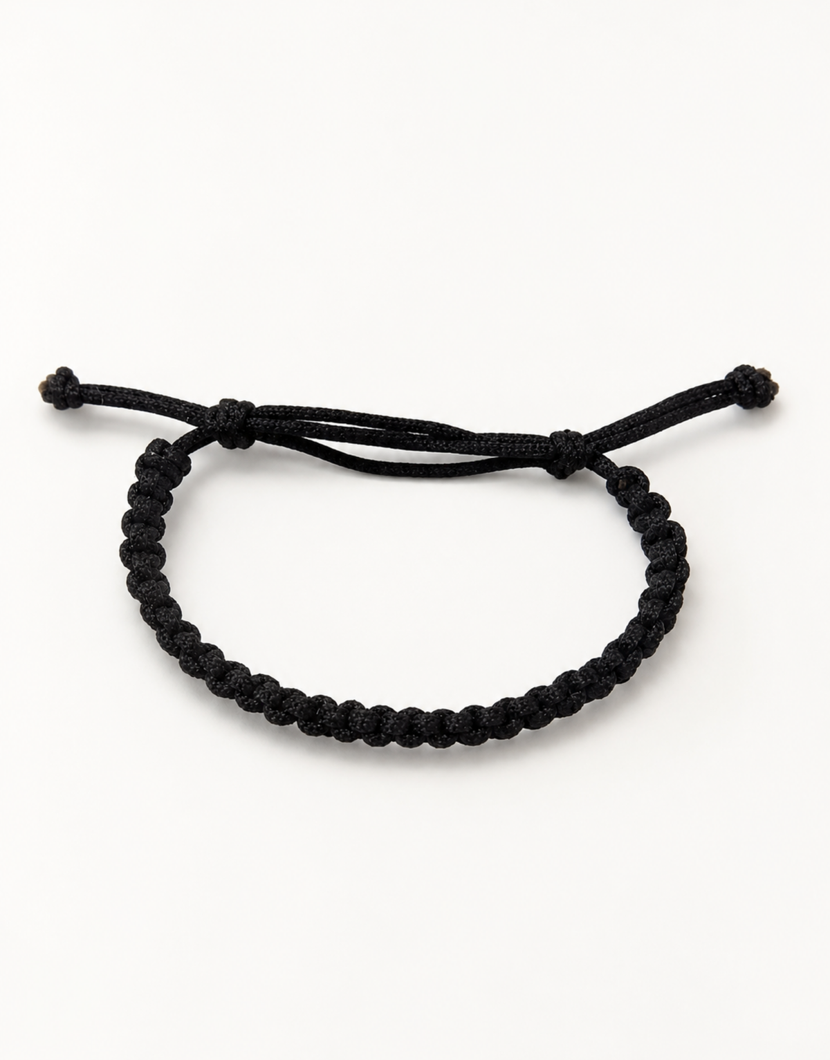 Khayt slim black macrame bracelet for men and women, handmade by Giraa in Pakistan