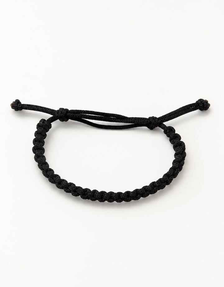 Khayt slim black macrame bracelet for men and women, handmade by Giraa in Pakistan