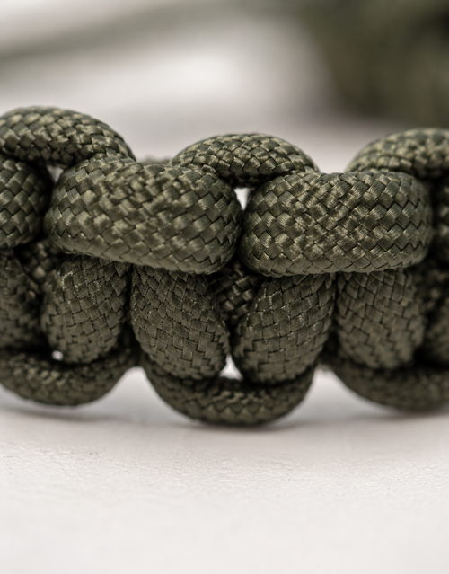 Macro of the dark green cobra weave on the Akhdar paracord bracelet