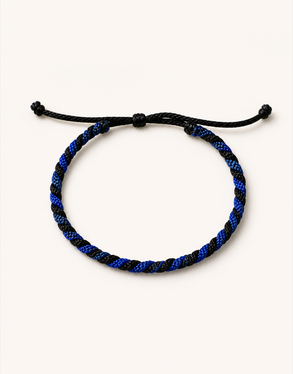Neelam blue and black twist macrame bracelet, handmade by Giraa in Pakistan