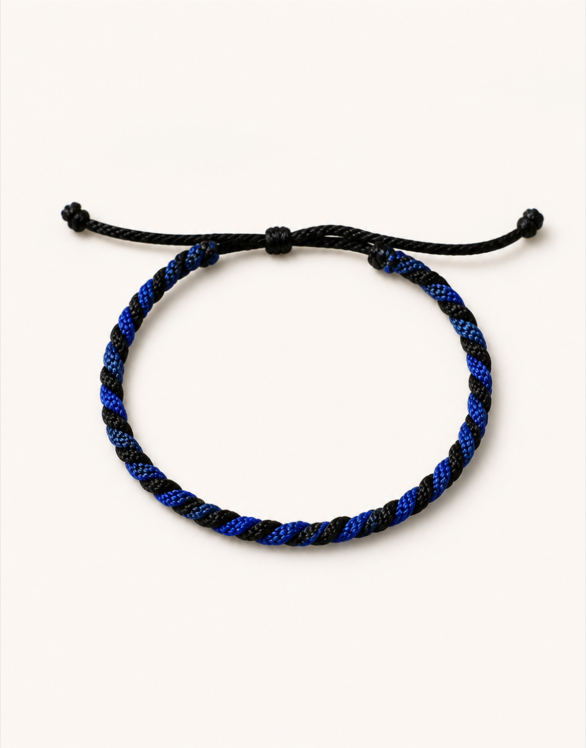 Neelam blue and black twist macrame bracelet, handmade by Giraa in Pakistan