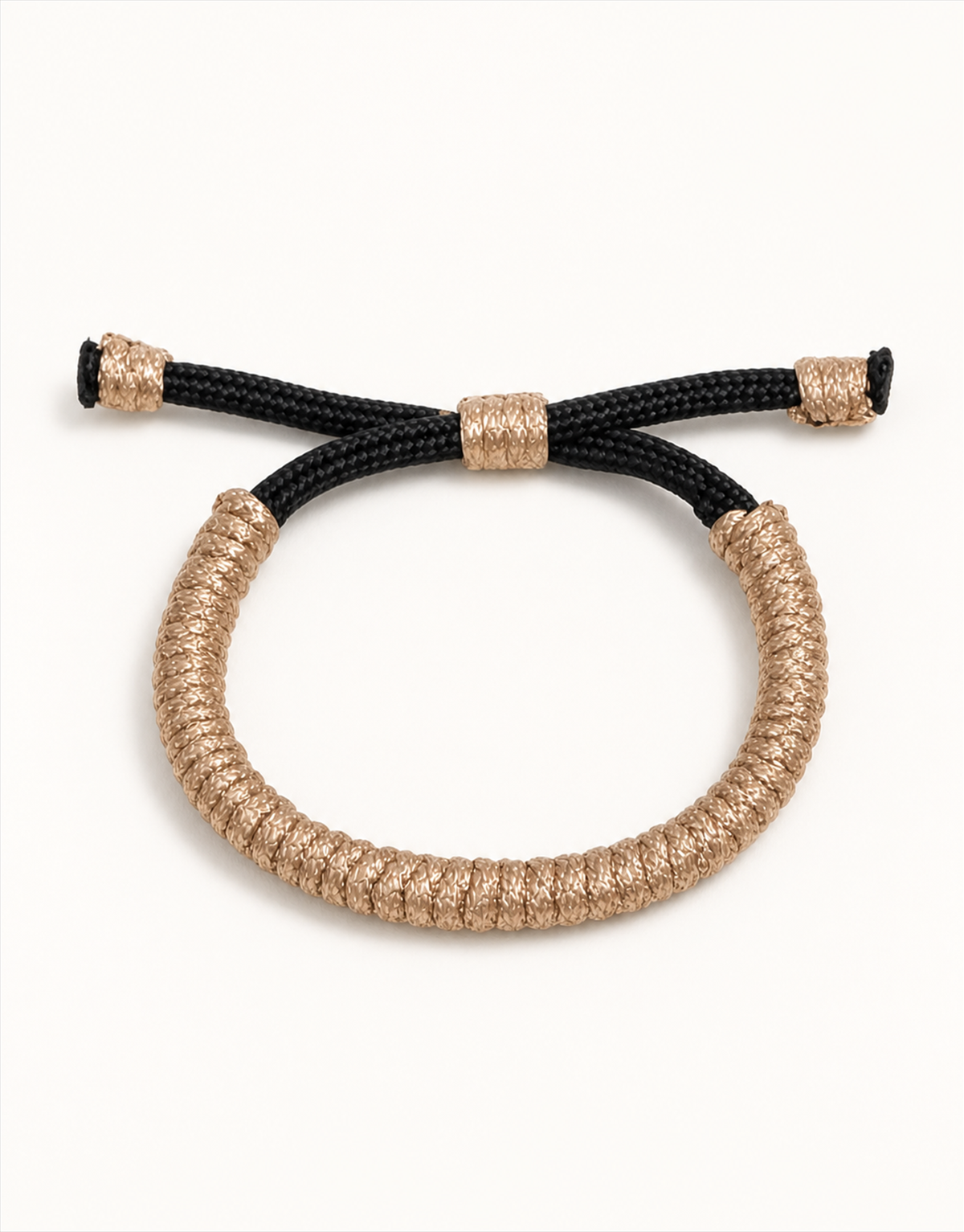 Kathib tan spiral macrame bracelet with black closure, handmade by Giraa in Pakistan