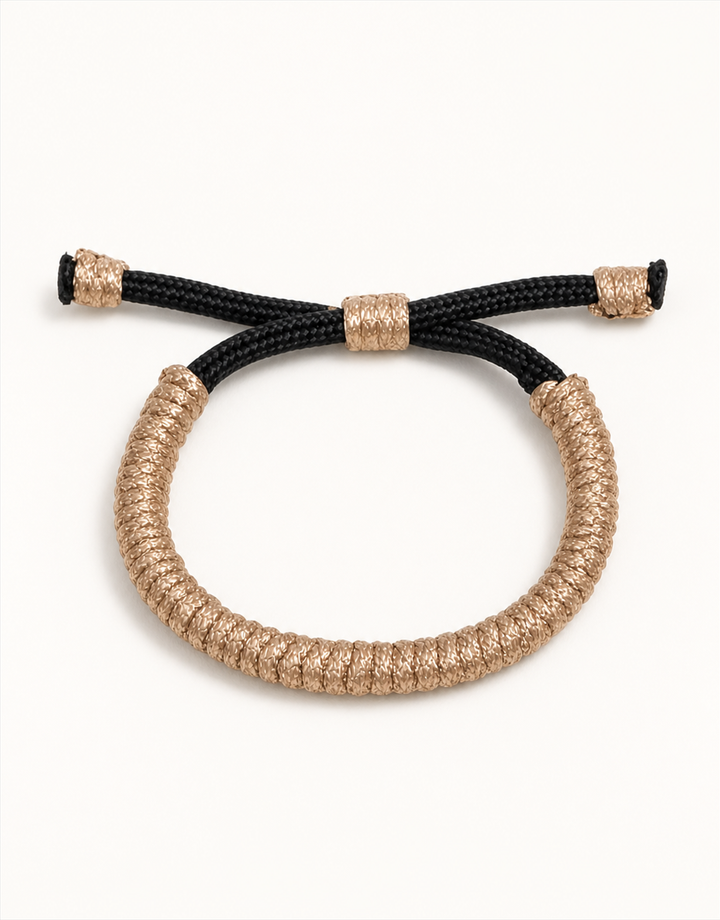 Kathib tan spiral macrame bracelet with black closure, handmade by Giraa in Pakistan