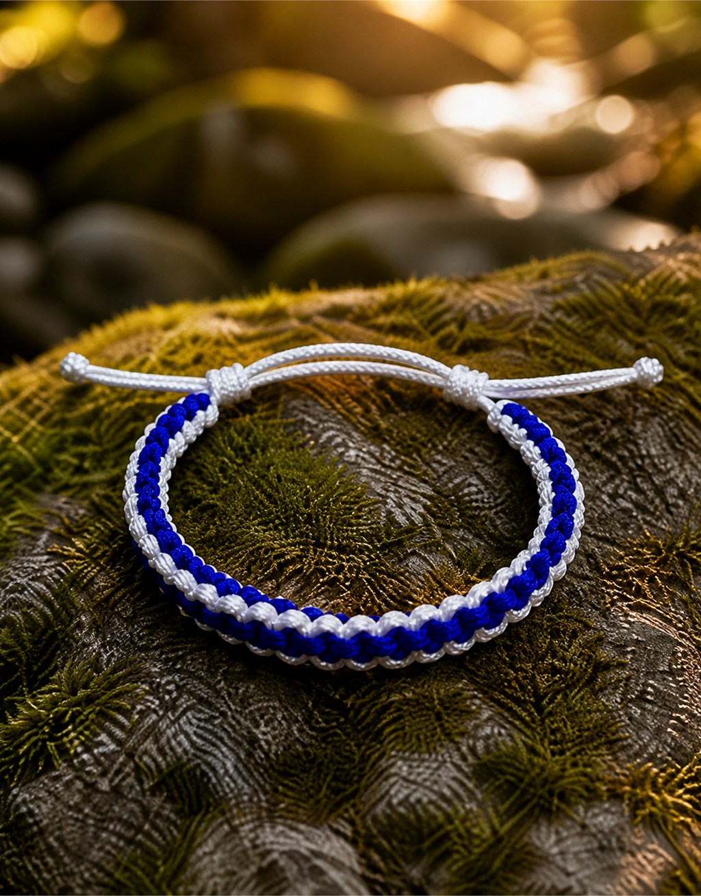 Samawi blue macrame bracelet on a mossy rock