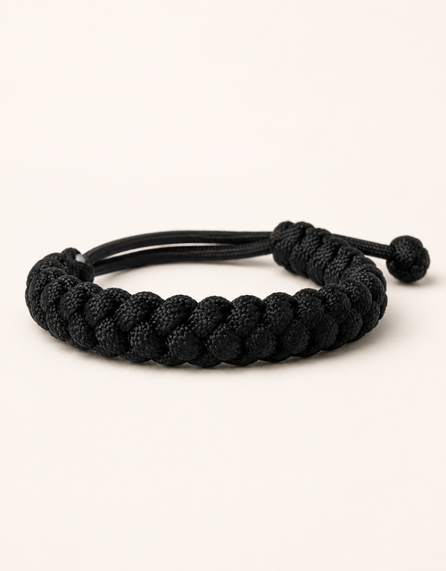 Pech black spiral paracord bracelet for men, handmade by Giraa in Pakistan