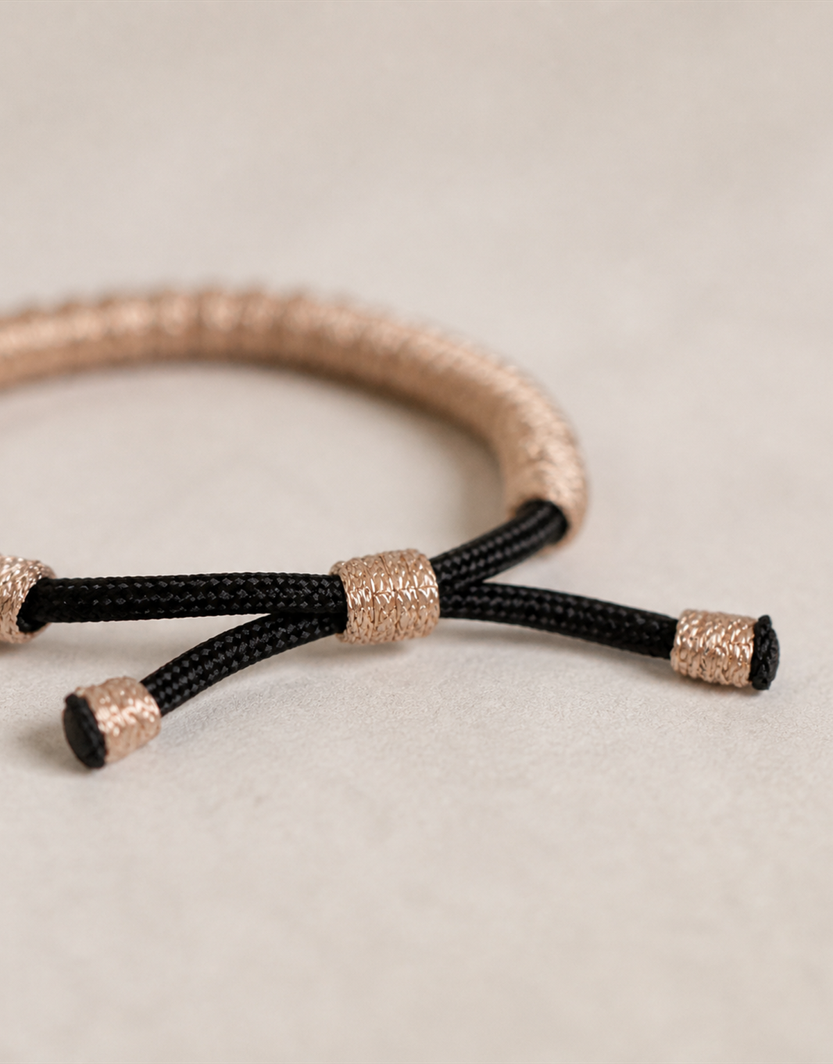 Closure and cord detail on the Kathib tan macrame bracelet