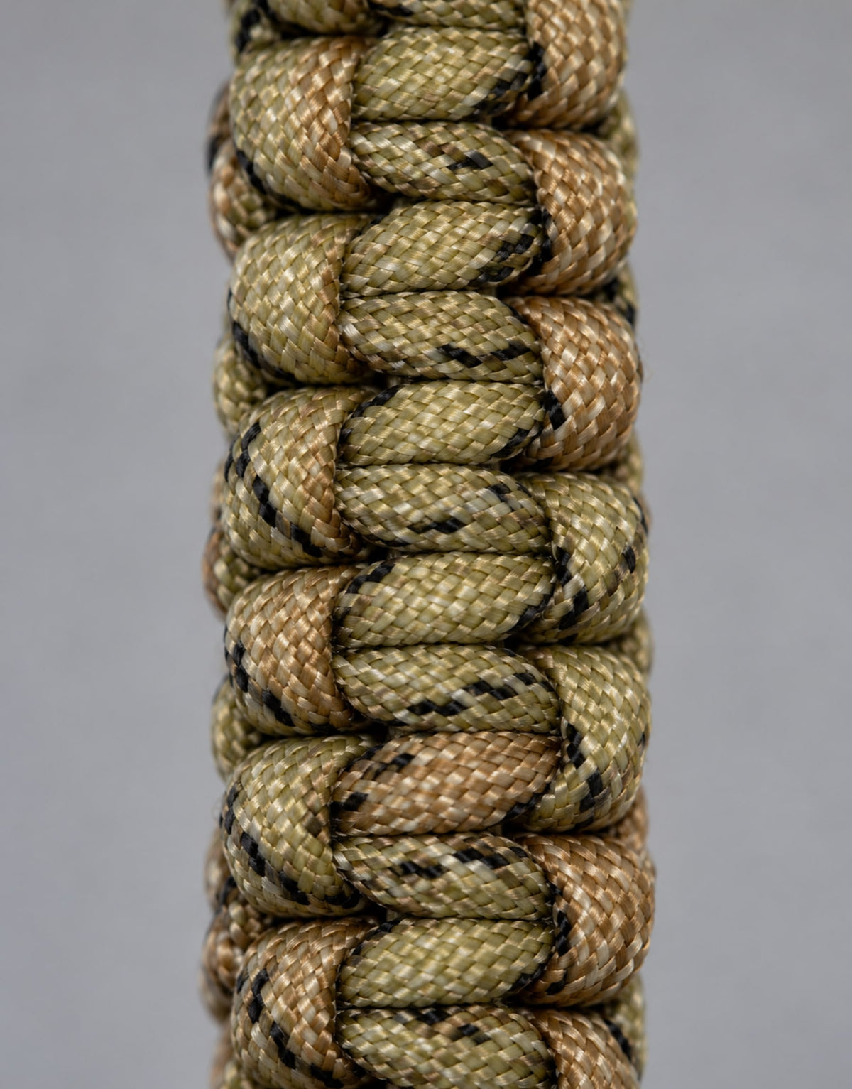 Close-up of the camo cobra weave on the Naag paracord keychain