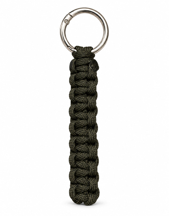 Naag dark green cobra weave paracord keychain with steel ring, handmade by Giraa, Pakistan